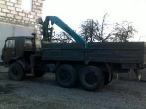 Камаз 43 4310 специальный с манипулятором-для перевозки стройматериалов и оборудования.