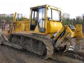 Экскаватор-погрузчик Terex-820 и Асфальтоукладчик Demag-130