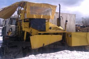 Экскаватор-погрузчик Terex-820 и Асфальтоукладчик Demag-130