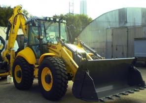 Экскаватор Погрузчик New Holland B115