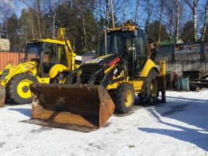 - Caterpillar 428E