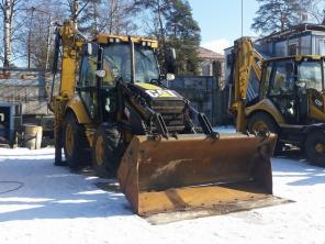 - Caterpillar 428E