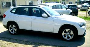 2010 . BMW X1    2,0 L diesel